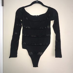 Fashion nova on the fence fishnet bodysuit